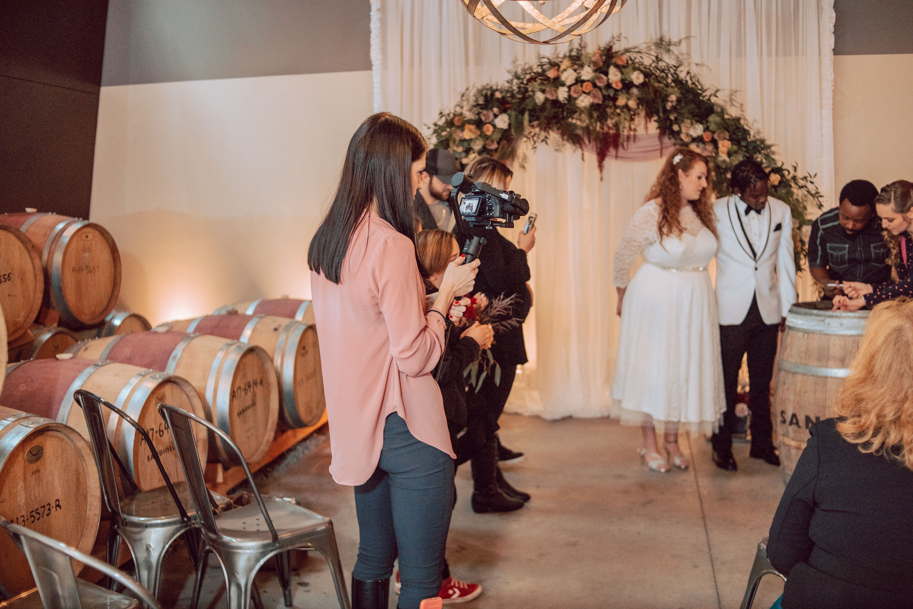 Deanna filming a wedding